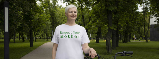 woman on bike wearing respect your mother tee